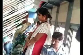 Tamil doll groping encircling train